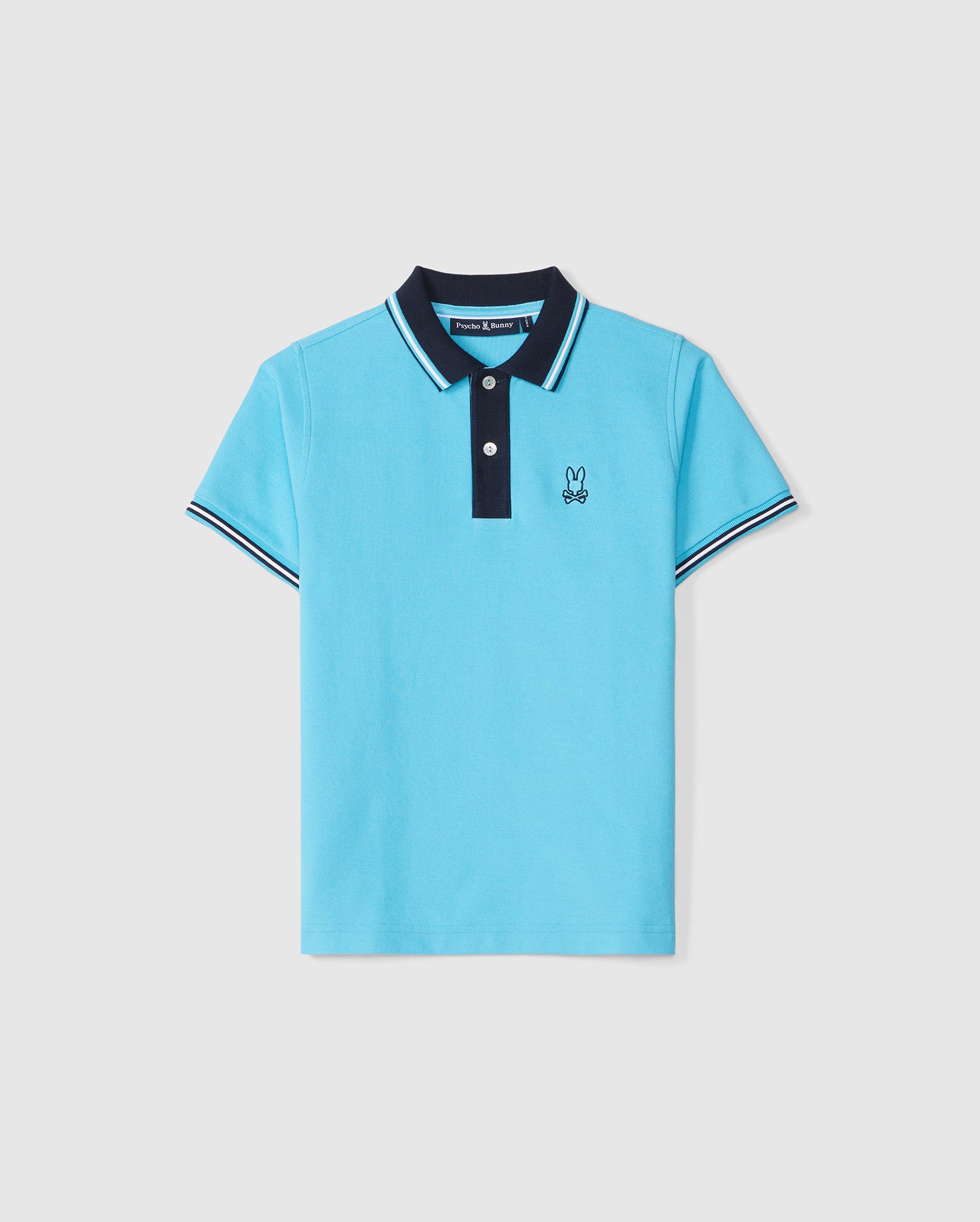 The Psycho Bunny KIDS SALINA PIQUE POLO SHIRT - B0K379B200 is a bright blue option with short sleeves, perfect for casual to dressy occasions. It features a black collar with white stripes, a black button placket with two buttons, and a small black embroidered cartoon bunny logo on the left chest. The sleeve hems have matching black and white stripes.