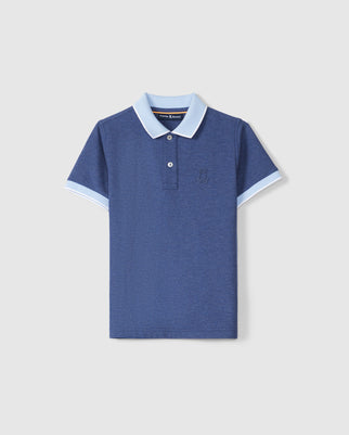 A Psycho Bunny KIDS WINDCREST PIQUE POLO SHIRT - B0K592C200 in navy blue with a light blue striped collar and sleeve edges. The shirt features a two-button placket and a small embroidered chest logo on the left side. The fabric appears to be knit, providing a neat and casual style. The shirt is laid flat against a light gray background.