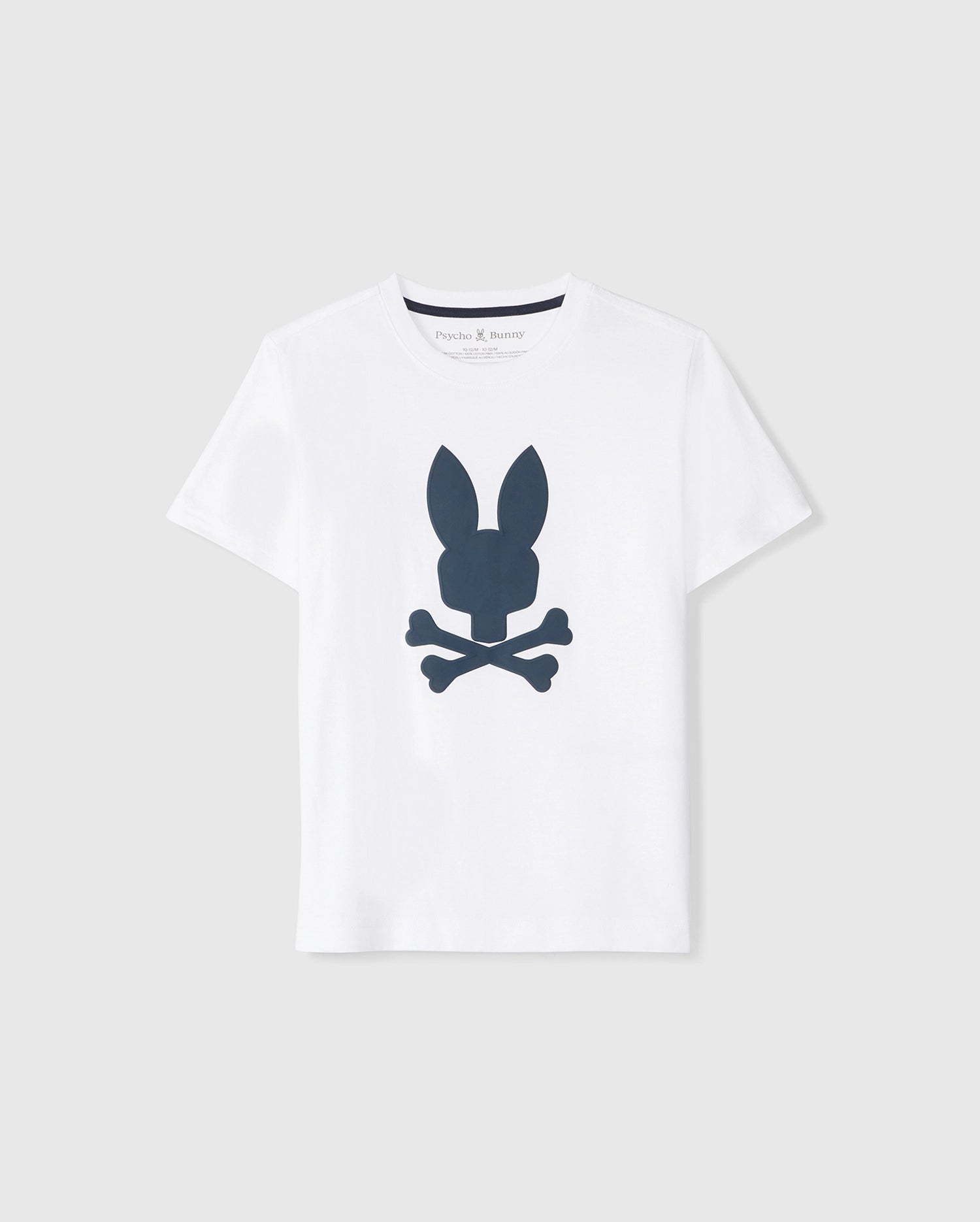 A plain white Pima cotton t-shirt featuring a central graphic of a dark blue silhouette of a rabbit head above crossed bones, displayed against a neutral background - Psycho Bunny KIDS HOUSTON GRAPHIC TEE - B0U607C200