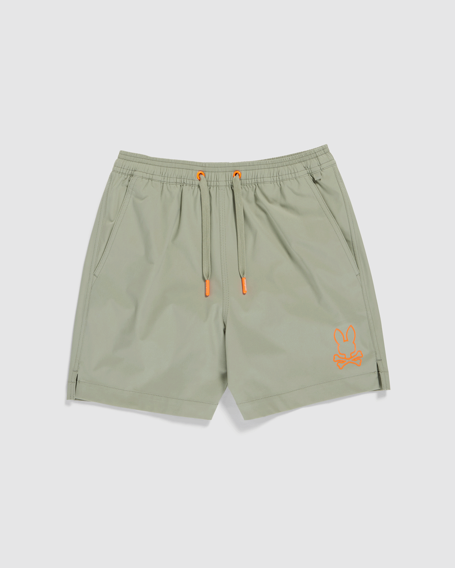 A pair of light green athletic shorts featuring an elastic waistband with orange drawstrings. The quick-drying shorts have pockets on both sides and an orange embroidered logo of a rabbit with crossbones on the left leg, making them perfect for active days. Comes with a waterproof bag for convenience.

Product Name: KIDS PARKER HYDROCHROMIC SWIM TRUNK - B0W646C200
Brand Name: Psycho Bunny