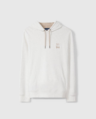 The Psycho Bunny MENS JAMES PREMIUM HOODIE - B6H789D200 is a light grey jersey hoodie featuring an embroidered bunny logo on the chest. It provides stylish warmth with a front pocket and light brown drawstrings.