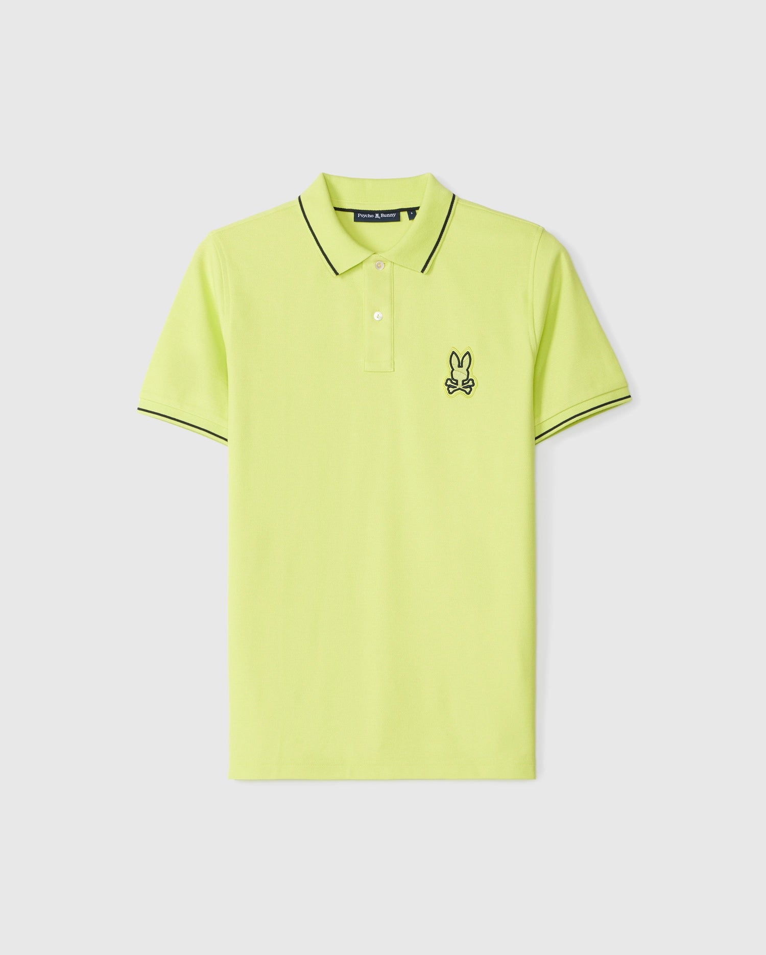 A lime green Pima cotton polo shirt with black trim on the collar and sleeves. It features an embroidered bunny head wearing sunglasses on the upper left chest area. The MENS LENOX PIQUE POLO SHIRT - B6K138B200 by Psycho Bunny includes a buttoned placket with two mother-of-pearl buttons.