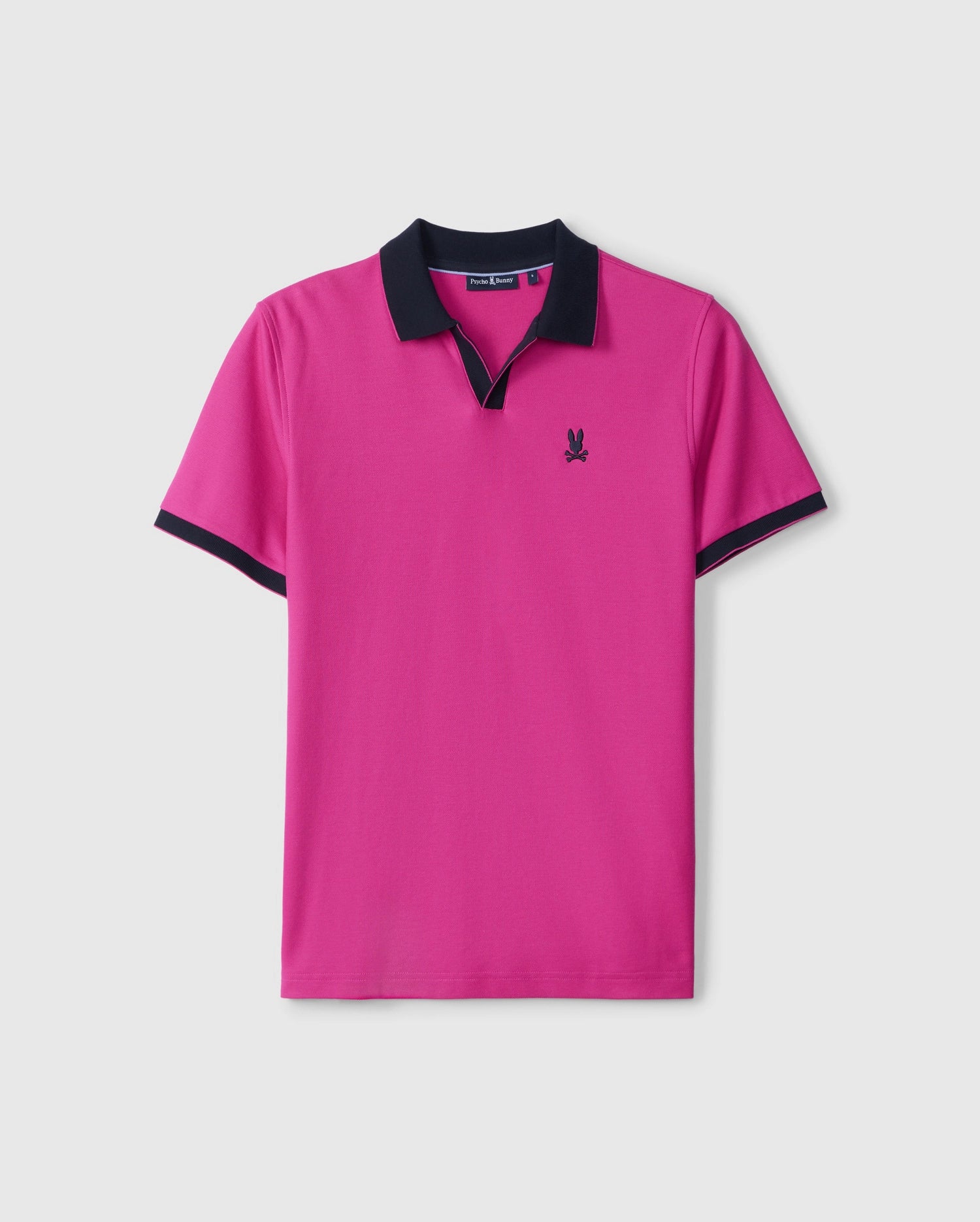 A vibrant pink short-sleeved Psycho Bunny Richards Johnny Collar Pique Polo Shirt (B6K641C200) features a distinctive black collar and black sleeve cuffs. Crafted from breathable Pima cotton, this stylish polo includes a subtle black embroidered logo of a bird with outstretched wings on the left chest. The background is plain white.