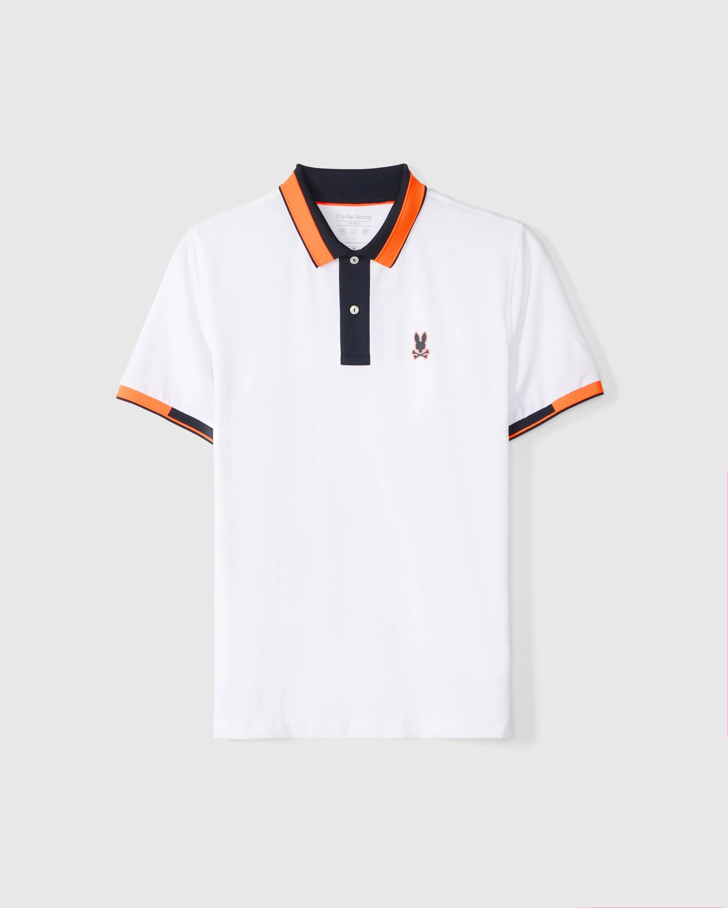 The MENS BELLEVUE SPORT POLO SHIRT by Psycho Bunny (B6K905D200) is a white shirt highlighted with black and orange trim on the contrast collar and sleeve cuffs. It showcases a black button placket and a small embroidered rabbit logo on the left chest. The plain light gray background enhances its stylish details perfectly.