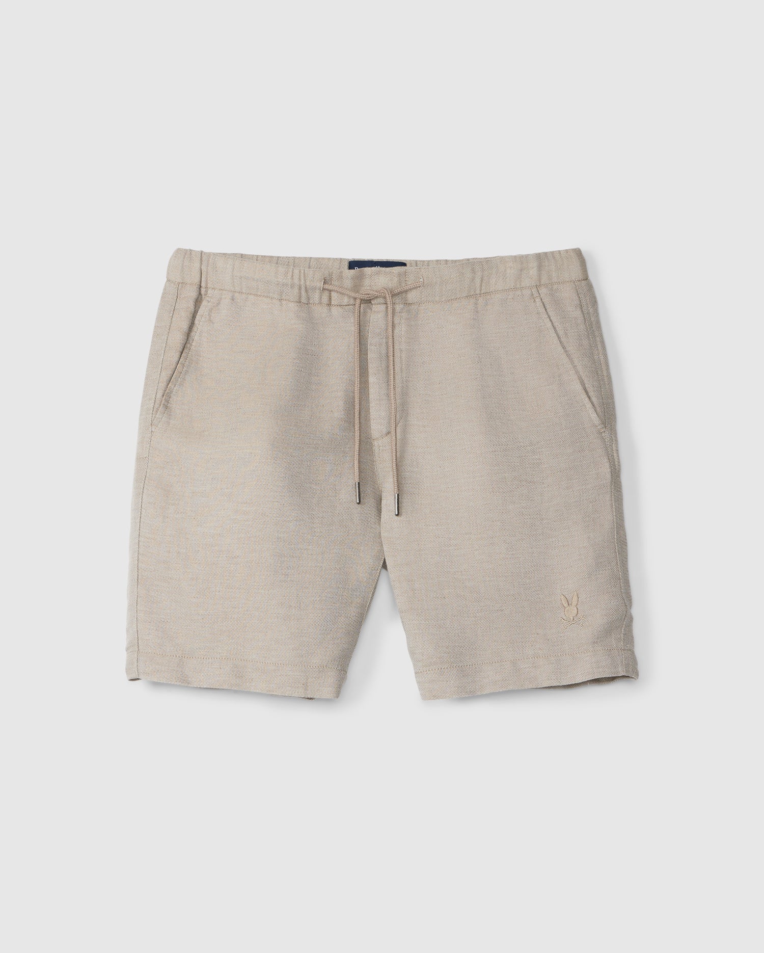 A pair of Psycho Bunny MENS WINDCREST LINEN SHORT - B6R474C200 made from a breathable linen-cotton blend, displayed on a white background, featuring a small embroidered emblem on the left thigh.
