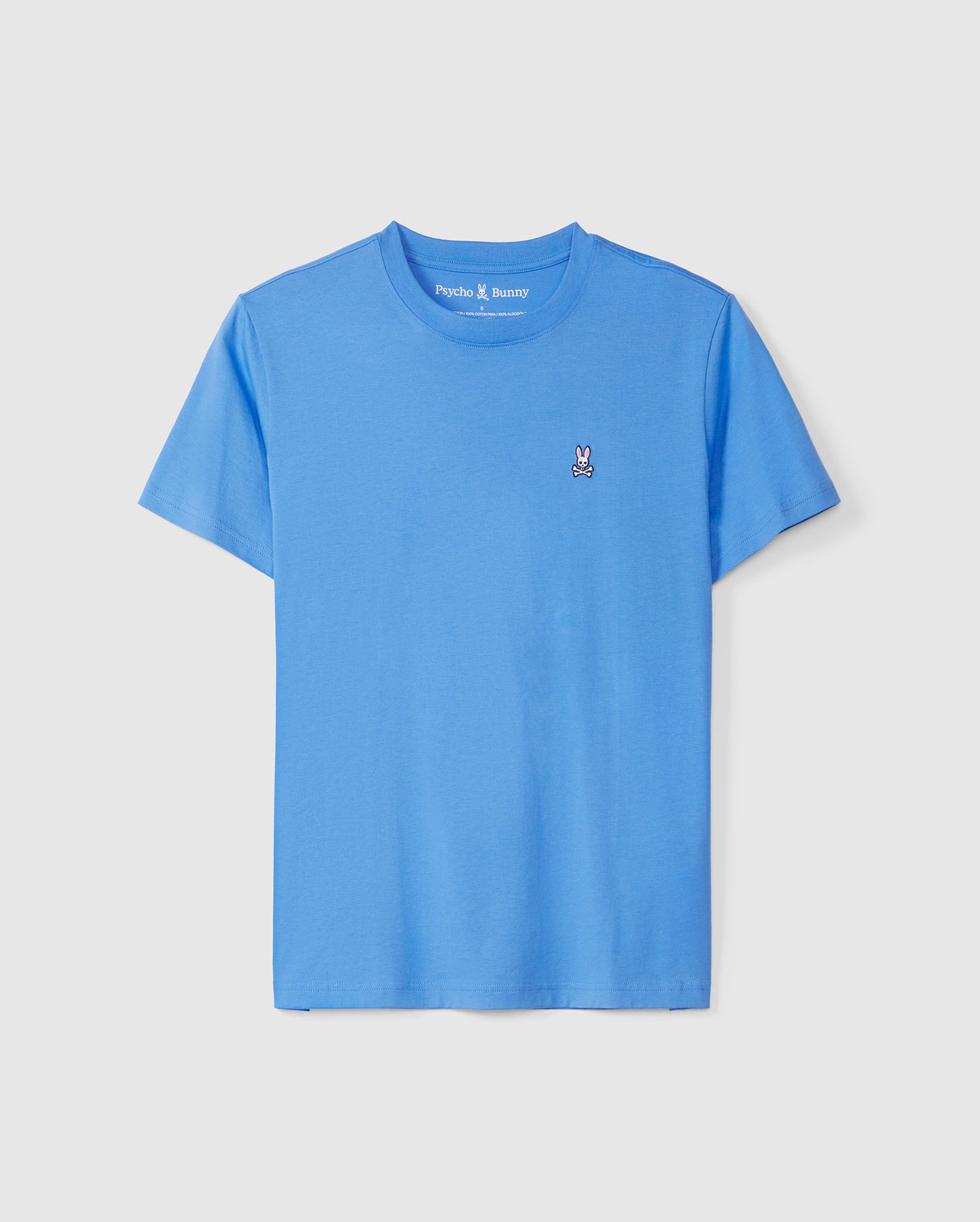 A light blue MENS CLASSIC CREW NECK TEE with a small white bunny logo on the left chest, displayed on a plain, neutral background by Psycho Bunny.