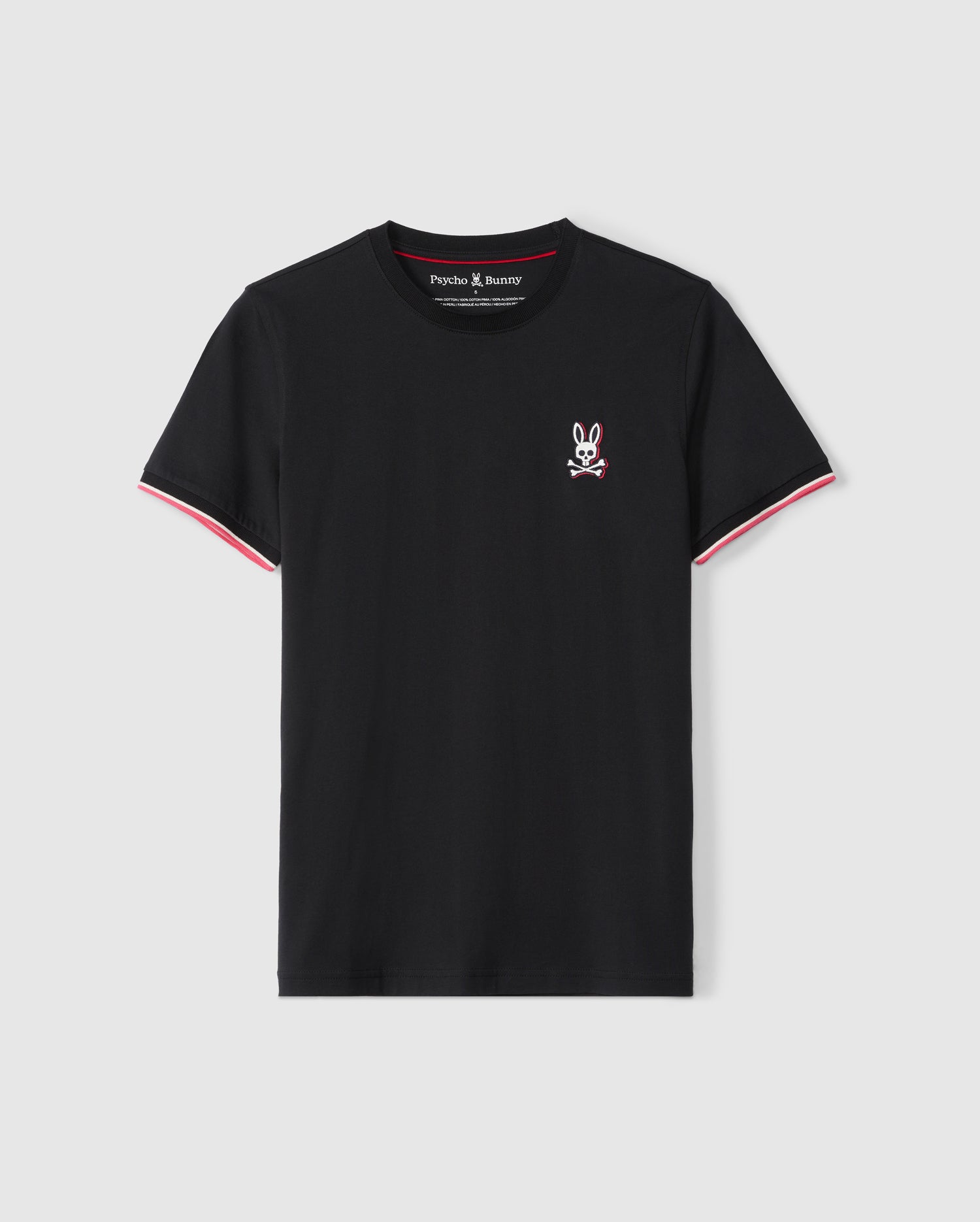Black short-sleeved fashion tee made from Pima cotton, featuring an embroidered white bunny skull and crossbones logo on the left chest. The sleeves and neckline have red and white trim detailing. The tag inside reads 