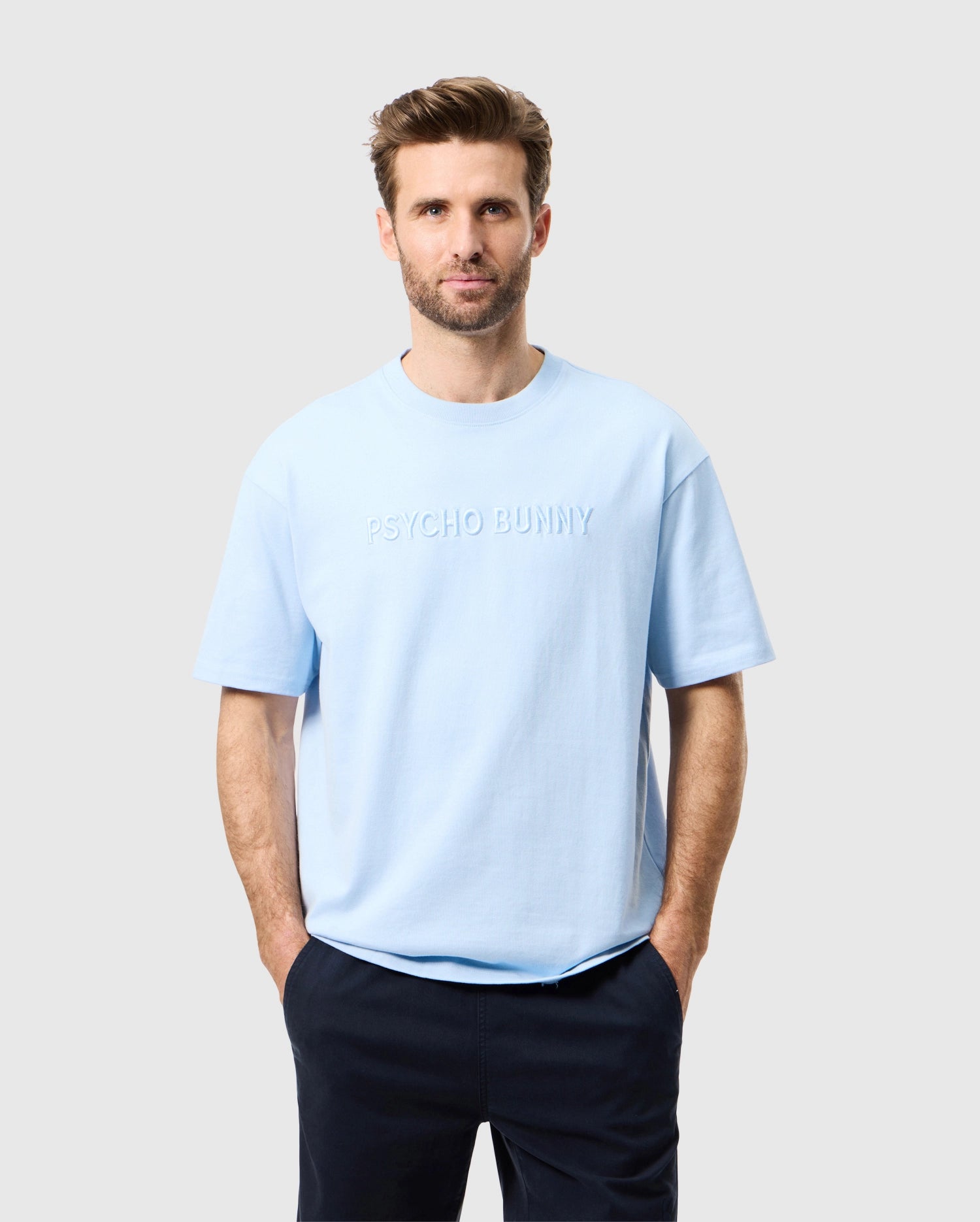 front view of male model wearing the pima cotton windcrest heavy weight tee in windsurfer