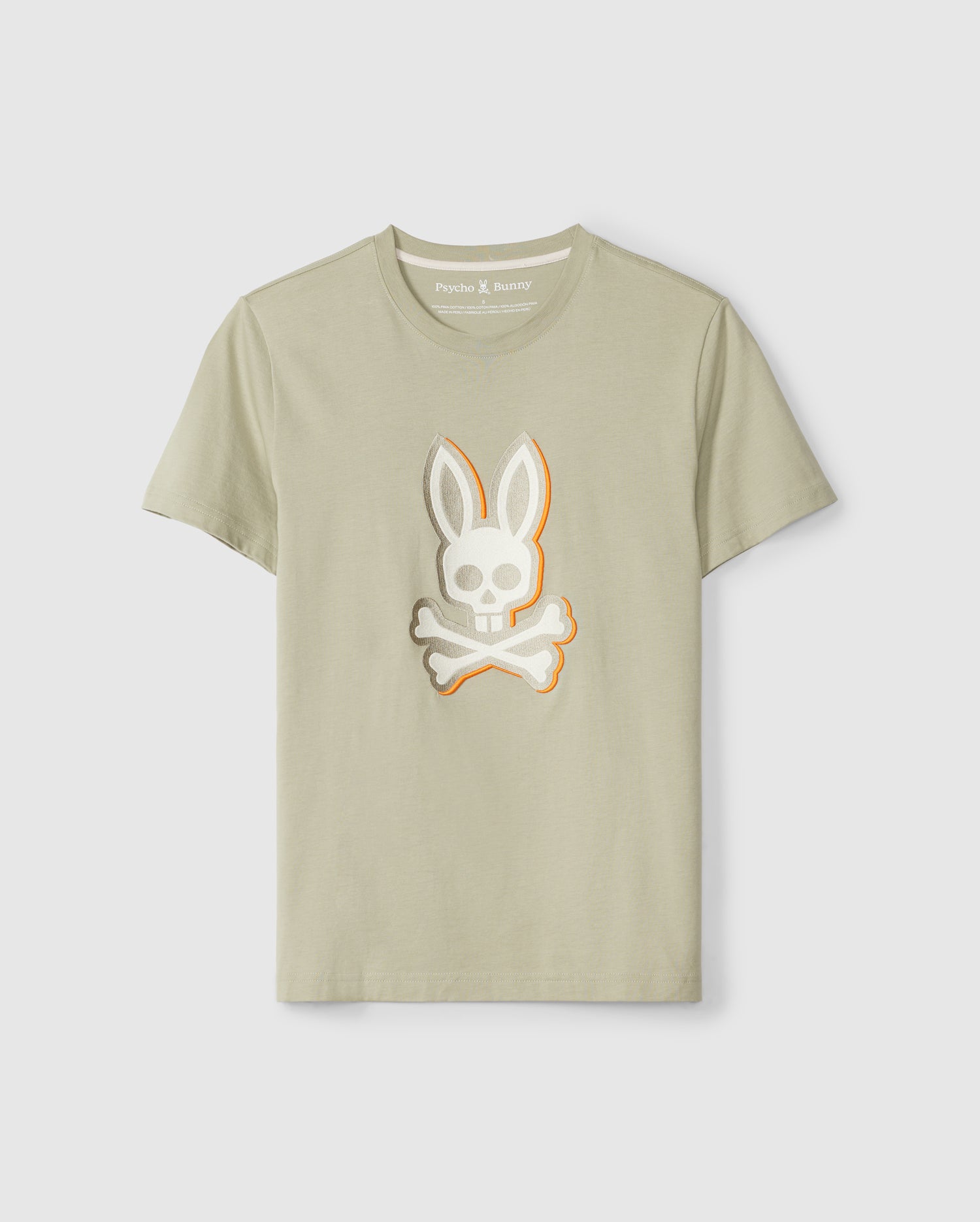 A light beige MENS KAYDEN GRAPHIC TEE - B6U676C200 featuring a stylized design of a skull with bunny ears and crossbones on the front center. Made from soft Pima cotton, the t-shirt displays the brand label 