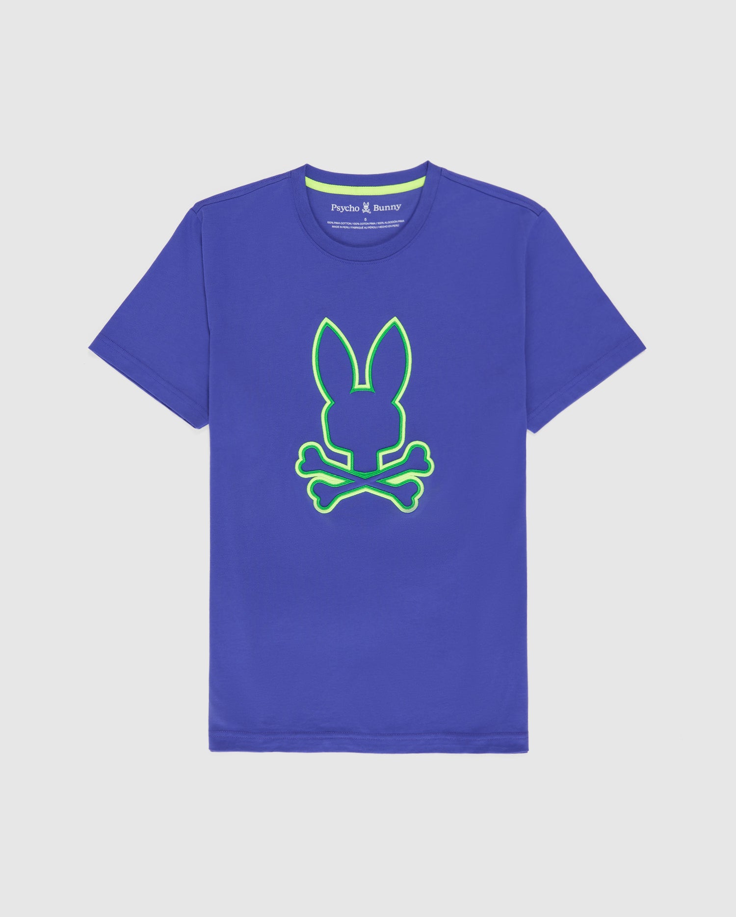 A blue Pima cotton t-shirt featuring a neon green outline of a bunny head with crossed bones beneath it on the front. The neckline has a printed tag that reads 