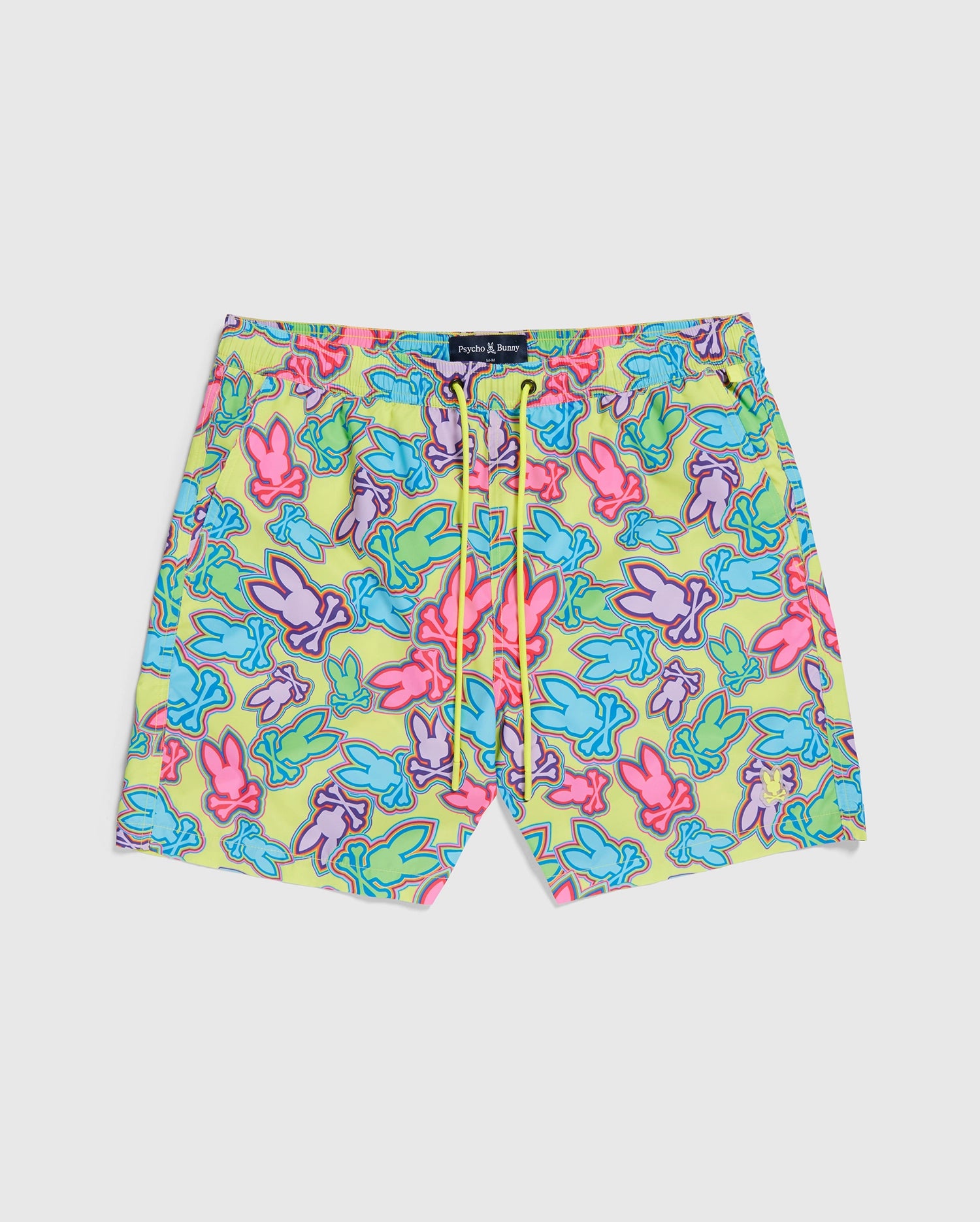 A pair of colorful swim trunks featuring a vibrant, abstract pattern of variously shaped figures in bright hues of pink, blue, green, and purple. Made from recycled polyester for a sustainability touch, the quick-dry MENS MAYBROOK LIGHTWEIGHT SWIM TRUNK - B6W119B2SW by Psycho Bunny includes an elastic waistband with a yellow drawstring and a black label at the front.
