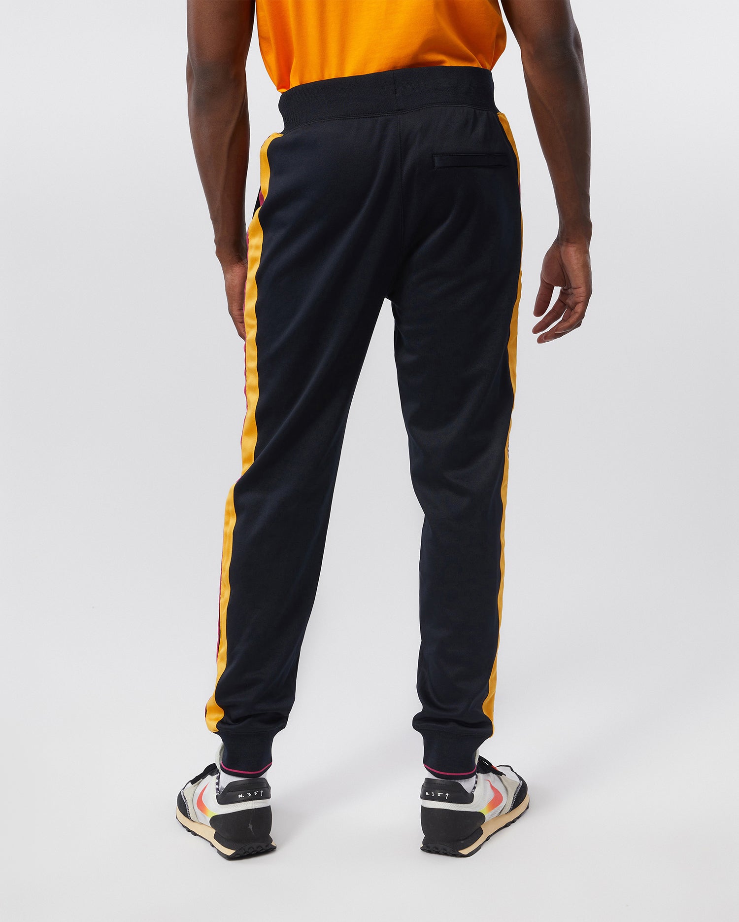 Track pants hotsell with stripe mens